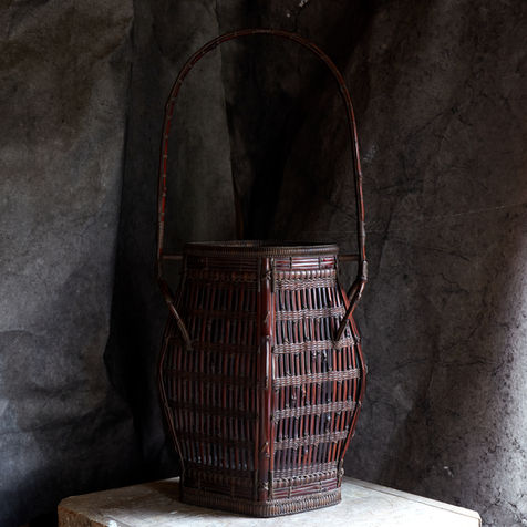 A masterful flower basket titled Hermit's Abode by Wada Waichisai III