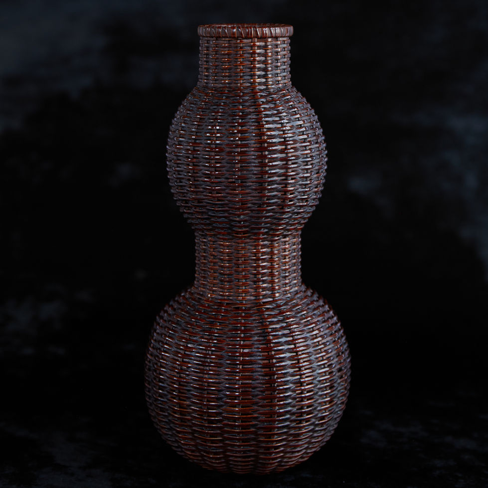Photo of a lovely bamboo wall basket in the form of a gourd by Uematsu Chikuyu 植松竹邑 a leading living Japanese bamboo artist