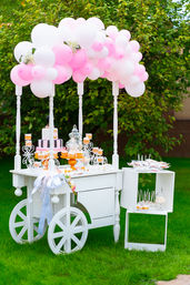 Pastel balloon dessert cart birthday decor Bangalore