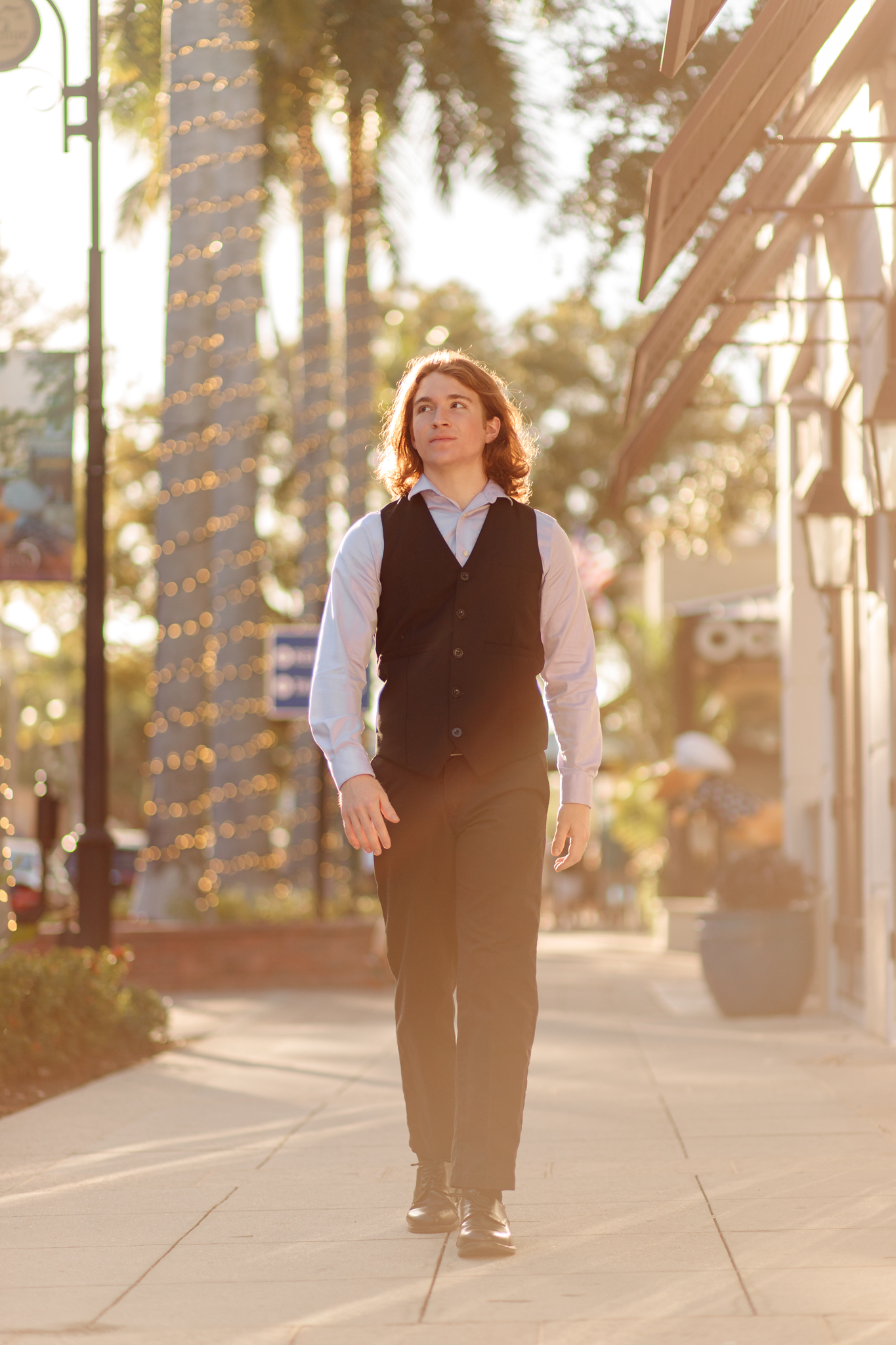 Senior boy session graduating senior photos downtown Naples, FL Photographer