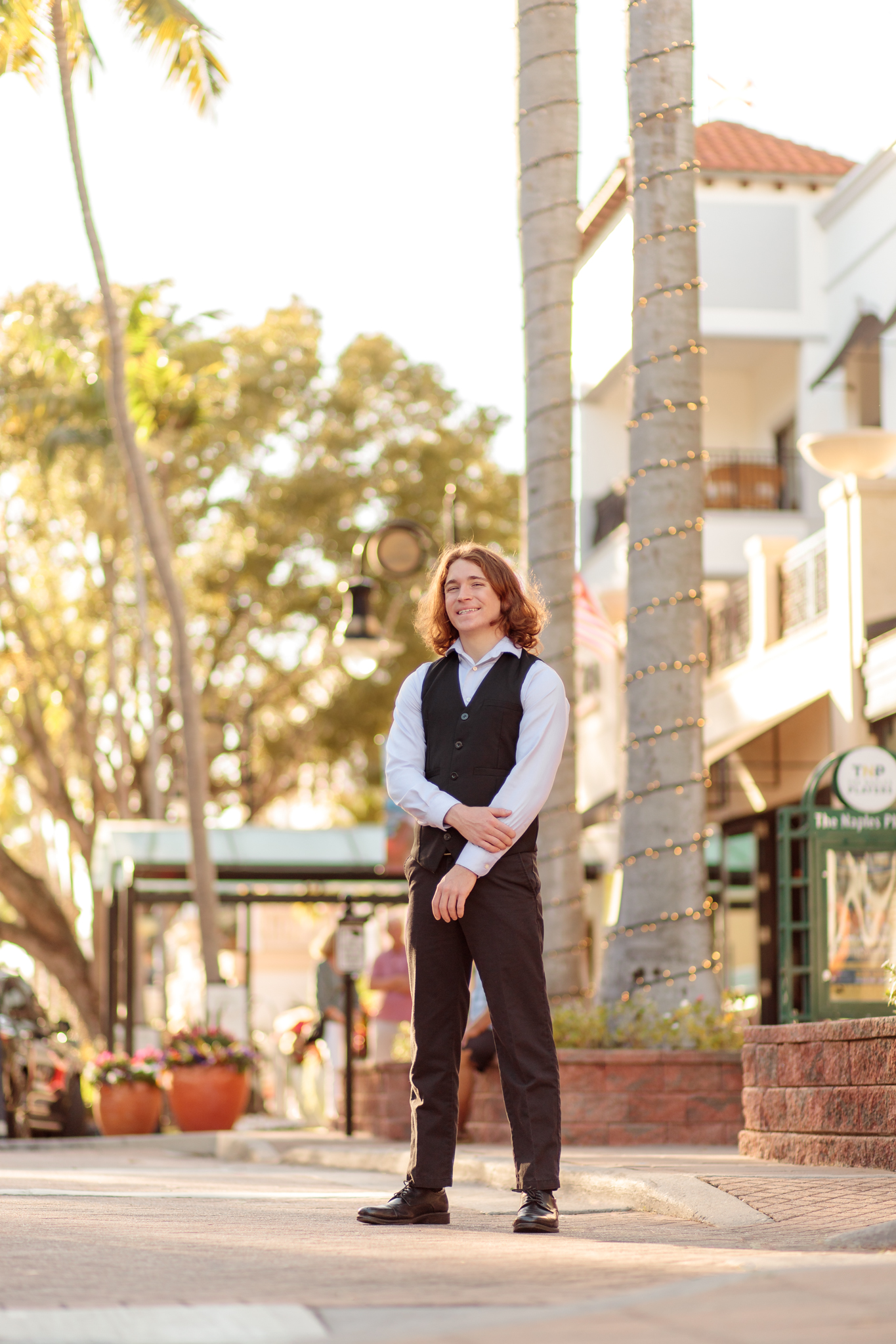 Senior boy session graduating senior photos downtown Naples, FL Photographer
