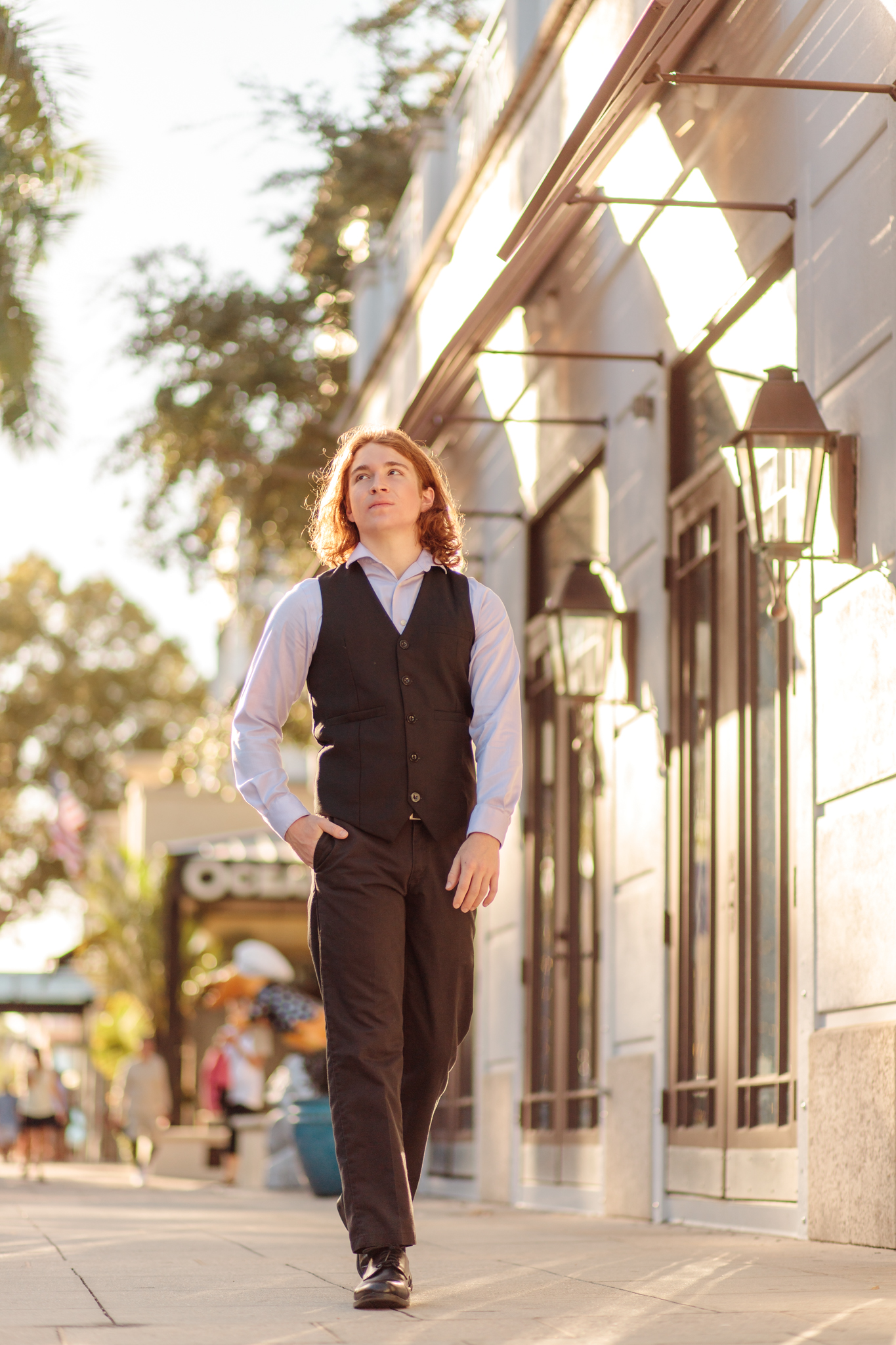 Senior boy session graduating senior photos downtown Naples, FL Photographer walking 5th Avenue