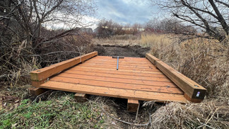 Installing new bridge in West Winds HOA