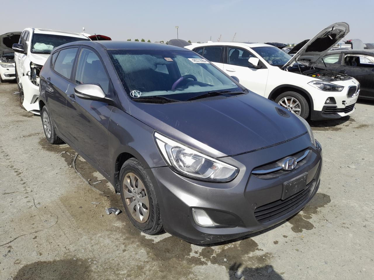 KMHCT51B5GU219858 HYUNDAI ACCENT 2016 GRAY VIN:Water/flood