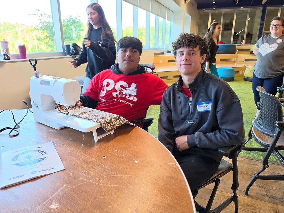students using a sewing machine