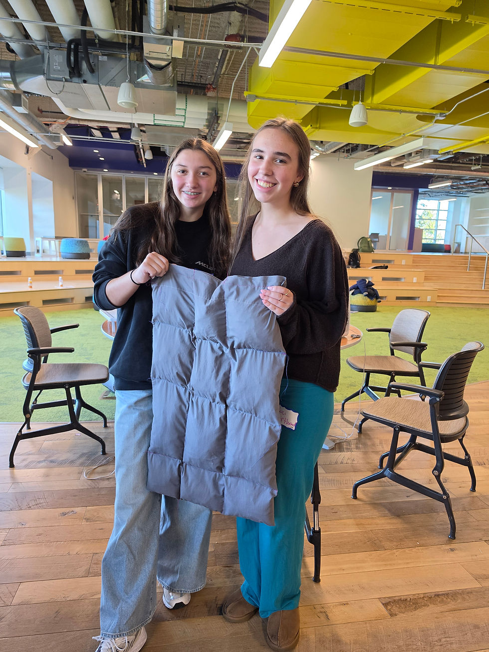 students holding a pet mat