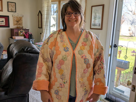 You too can turn an old quilt into a warm jacket.