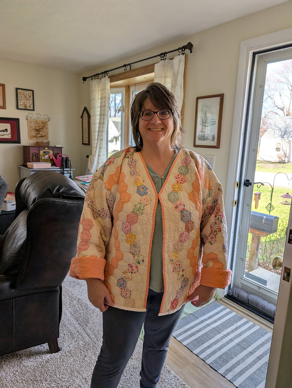 You too can turn an old quilt into a warm jacket.