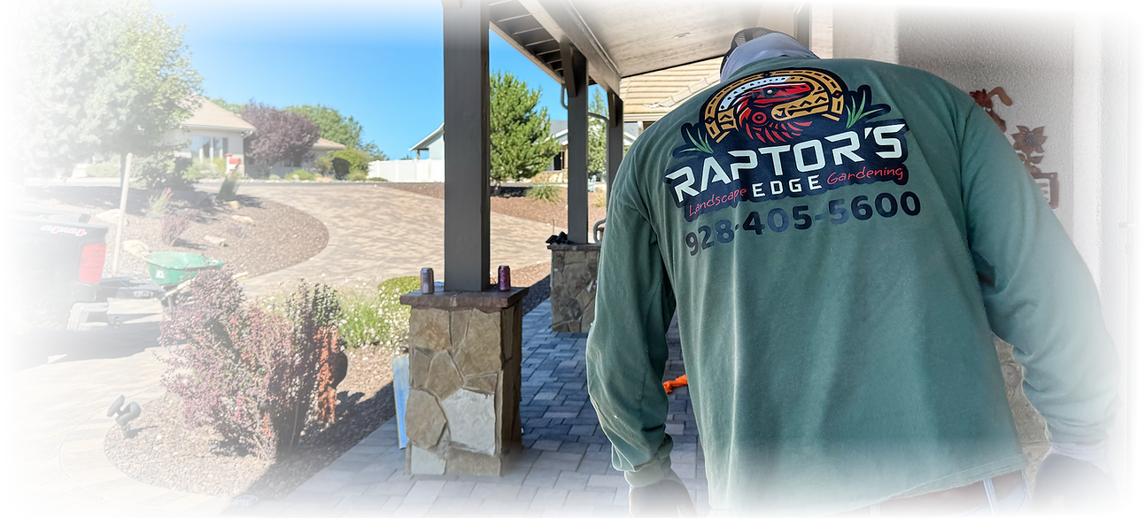 Raptors Edge crew member providing detail-focused property maintenance at a residential home