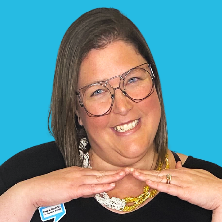 Headshot of a HUDSY team member smiling at the camera