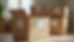 Eye-level view of neatly packed moving boxes labeled with contents