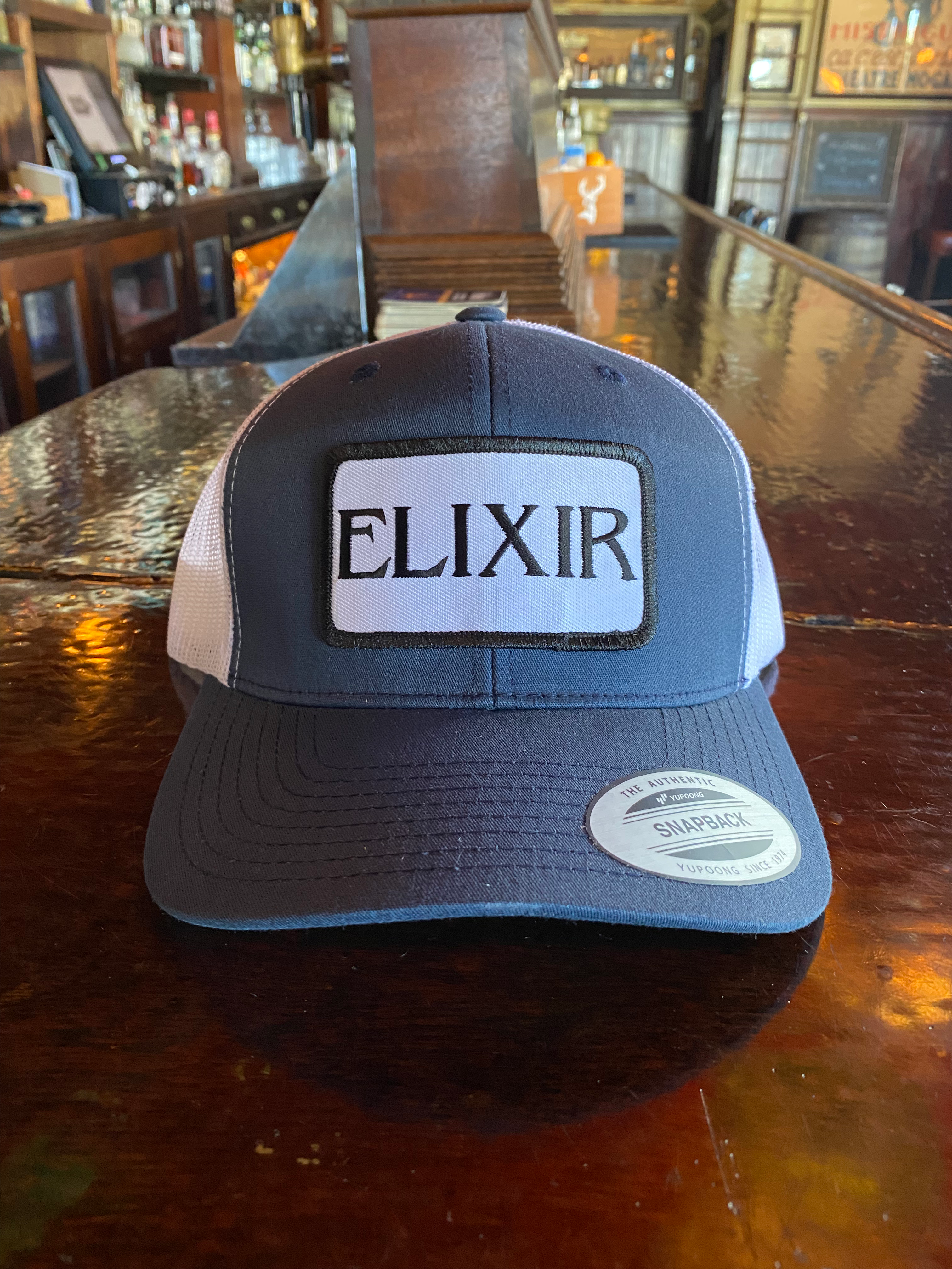 Blue Elixir Trucker Hat