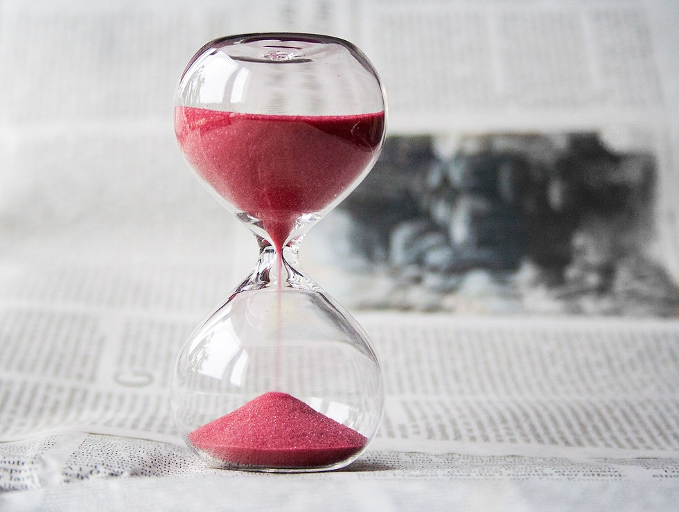 Image showing a busy entrepreneur efficiently organizing their schedule with digital tools, symbolizing effective time management practices.