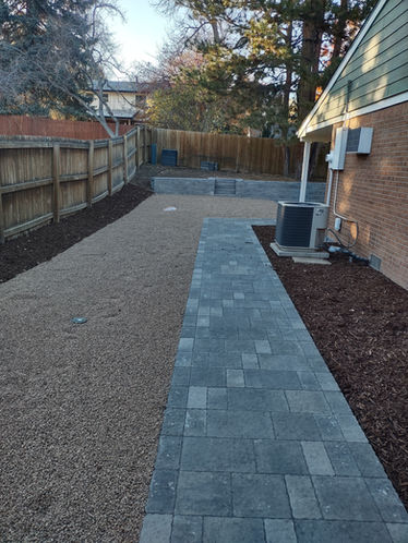 Stone paver walkway and side yard landscaping in Thornton Colorado