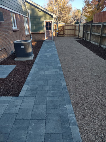 Residential hardscape walkway and gravel landscaping in Littleton Colorado