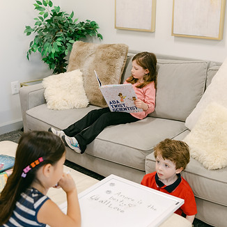 Amore students reading