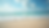 Eye-level view of a serene beach with gentle waves