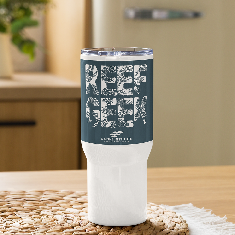 Front view of travel mug with handle, that has reef geek in coral patterns on it.