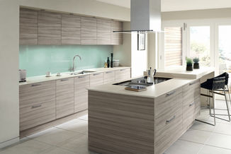 Modern wood grain kitchen with a stainless steel range hood