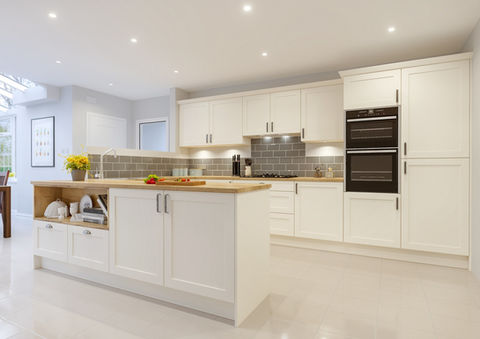 Contemporary white kitchen with a wood-topped island and integrated ovens