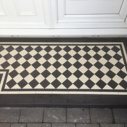 Black and white Victorian tiled doorstep.