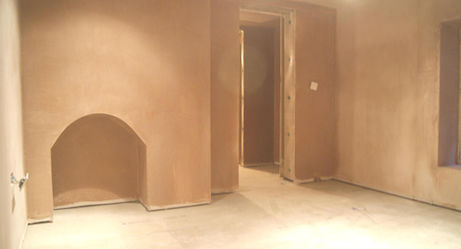 Completed plastering of a vaulted basement room ready for final decoration