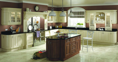 Classic kitchen with white cabinets and a dark wood central island
