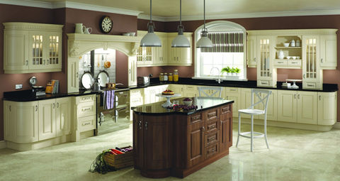 Classic kitchen with white cabinets and a dark wood central island