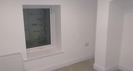 Cavity drainage system with black sealing tapes on vaulted walls