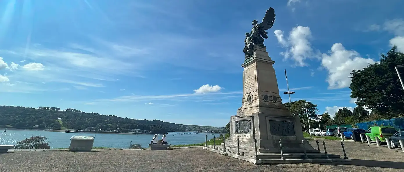 A monument by a lake