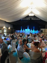 Wedding reception inside marquee