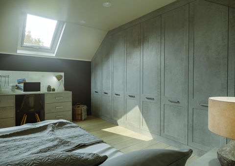 Attic room featuring floor-to-ceiling grey textured wardrobes