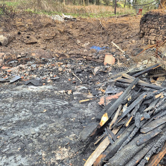 Timber and rubble piled for collection