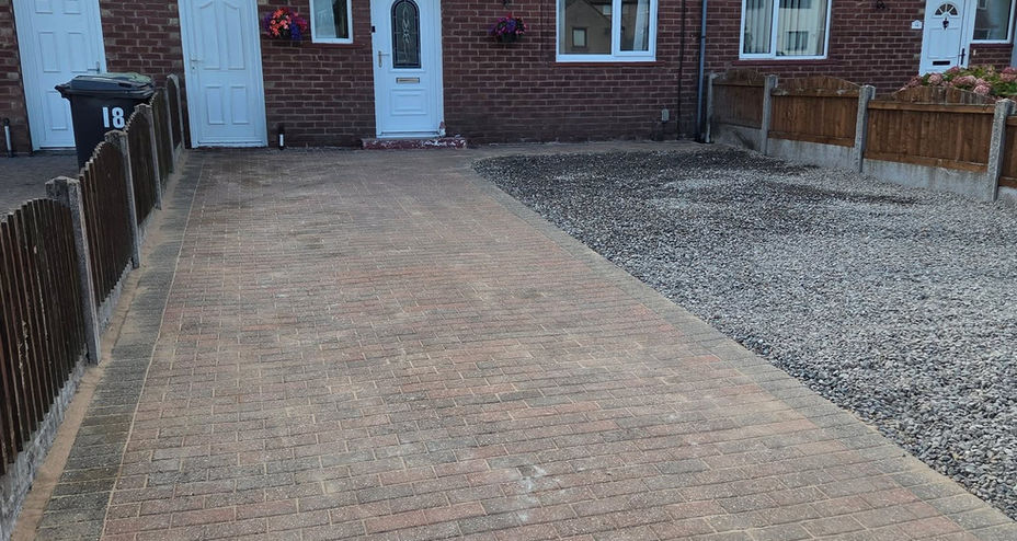 Block paving driveway refurbishment in front of terraced residential properties