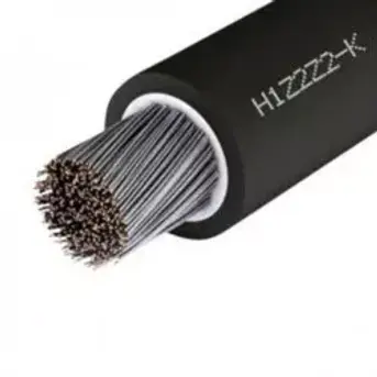 Close-up of a black electrical cable with exposed silver wires, showing a cross-section