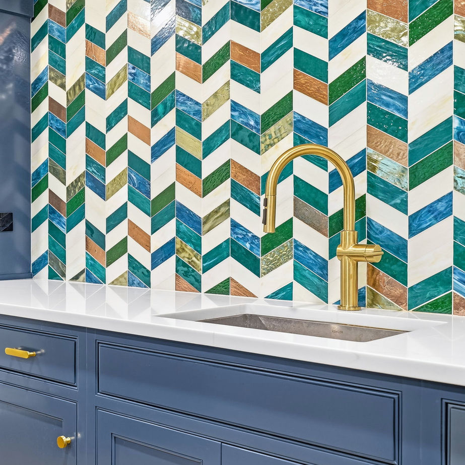 Green, blue and copper chevron tile backsplash with brass faucet | Interior design by Dominique Michelle Vidal
