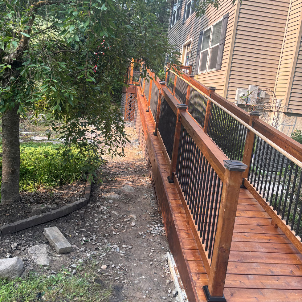 Custom cedar deck with ramp in Orange County NY – outdoor wood deck design by Shaping Houses.