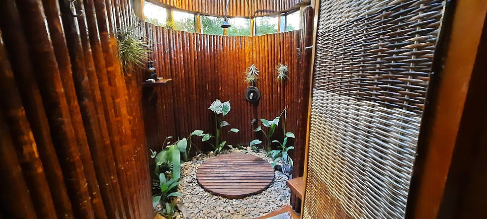 Outdoor nature shower with natural wood design at Casa Sophia, Alma Del Rio Eco-Comfort