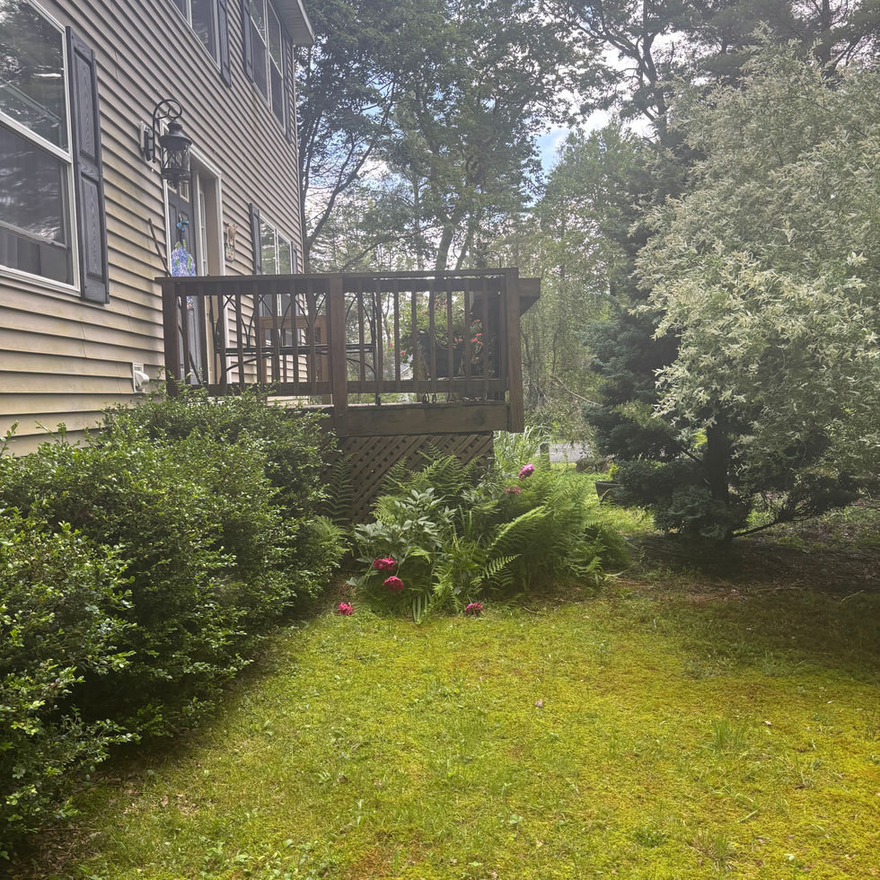 Custom cedar deck with ramp in Orange County NY – outdoor wood deck design by Shaping Houses.