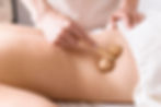 close-up-masseuse-using-instrument