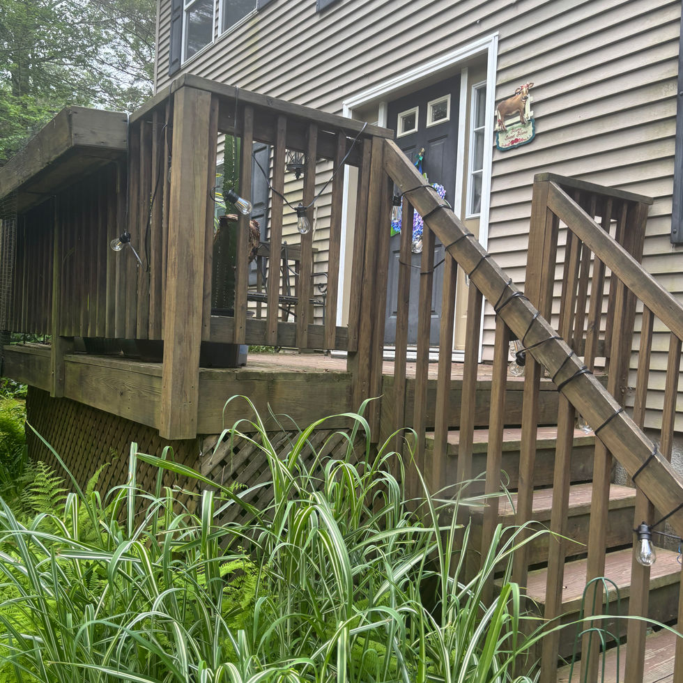 Custom cedar deck with ramp in Orange County NY – outdoor wood deck design by Shaping Houses.