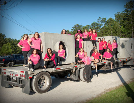 Girl employees sitting on a truck