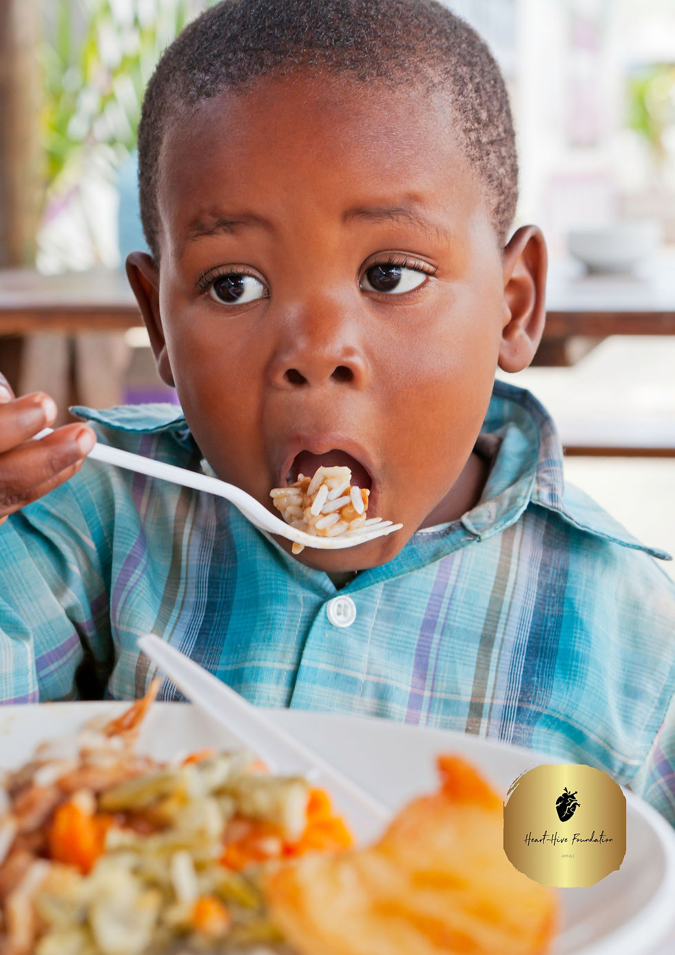African child eating nutritious food.