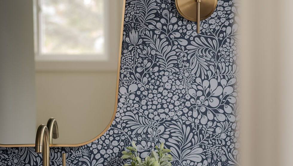 Custom powder room renovation in Montreal featuring floral wallpaper, brass fixtures, fluted wood cabinetry, custom lighting, and dark moody finishes.