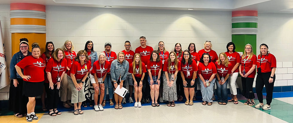 The Literacy Lift-Off staff gathers at Shearer Elementary where the program was held this summer.