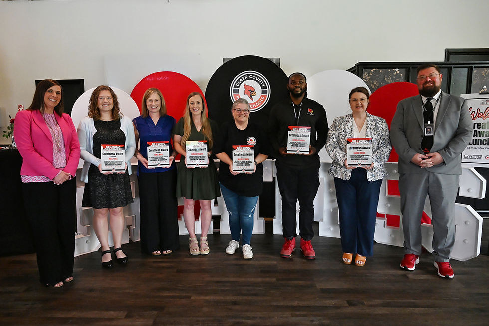 Assistant Superintendent Kelly Fithen, Molly Sell, Renee Ware, Chelsea Meiners, Michelle Sands, Nitavius Thomas, Carrie Reeder, and Superintendent Dustin Howard at the Greatness Awards Luncheon.