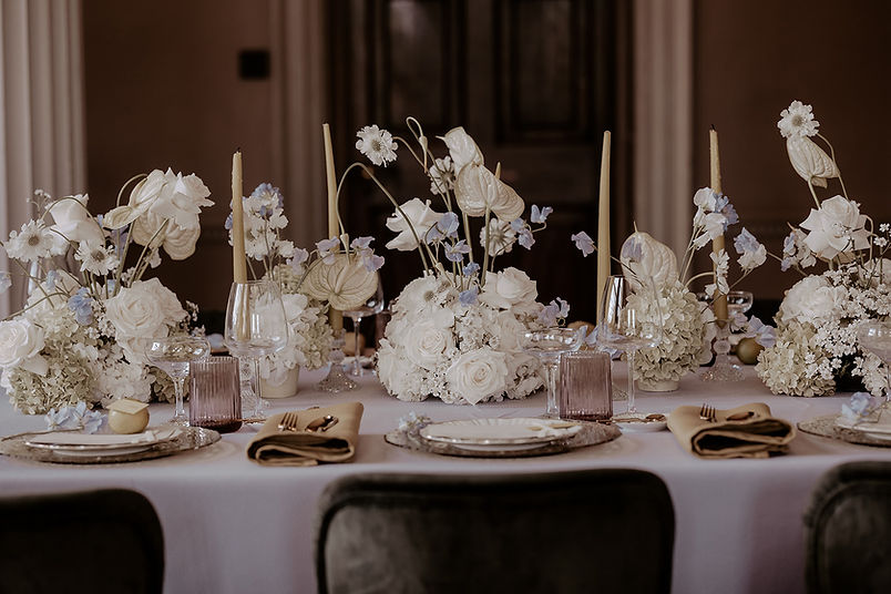 Lilac and lime wedding reception table with modern florals for a fresh and high end aesthetic