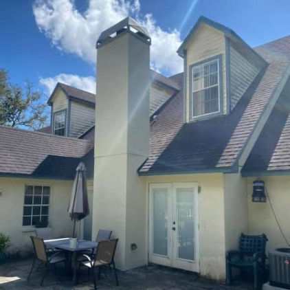 Exterior Chimney Siding Damage Before Repair