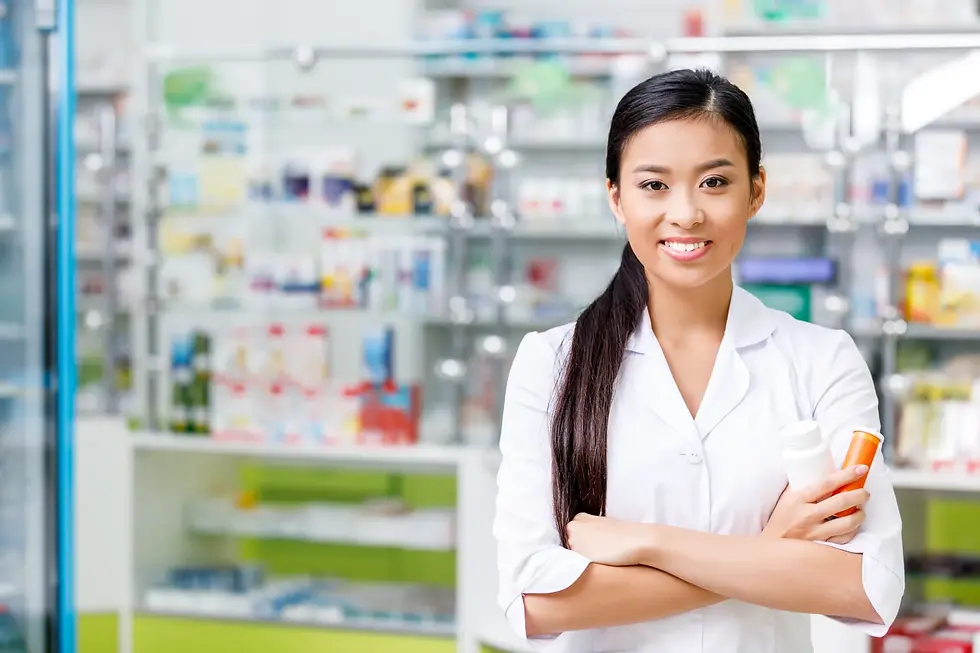 Confident young experienced female pharmacist
