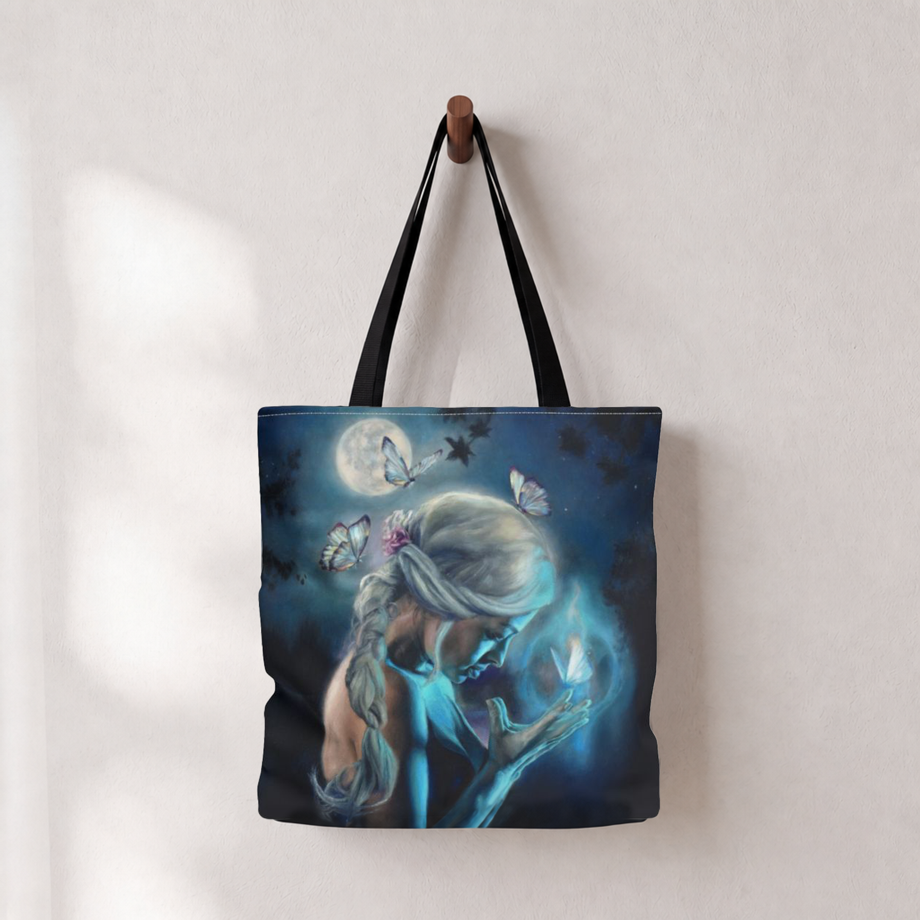 "Reverence," tote bag hanging on a hook by Alexandra Verhoven